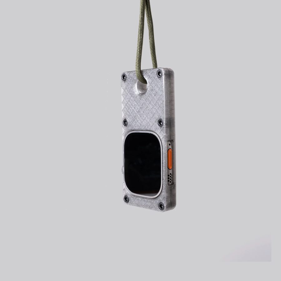 The case hanging from its paracord loop